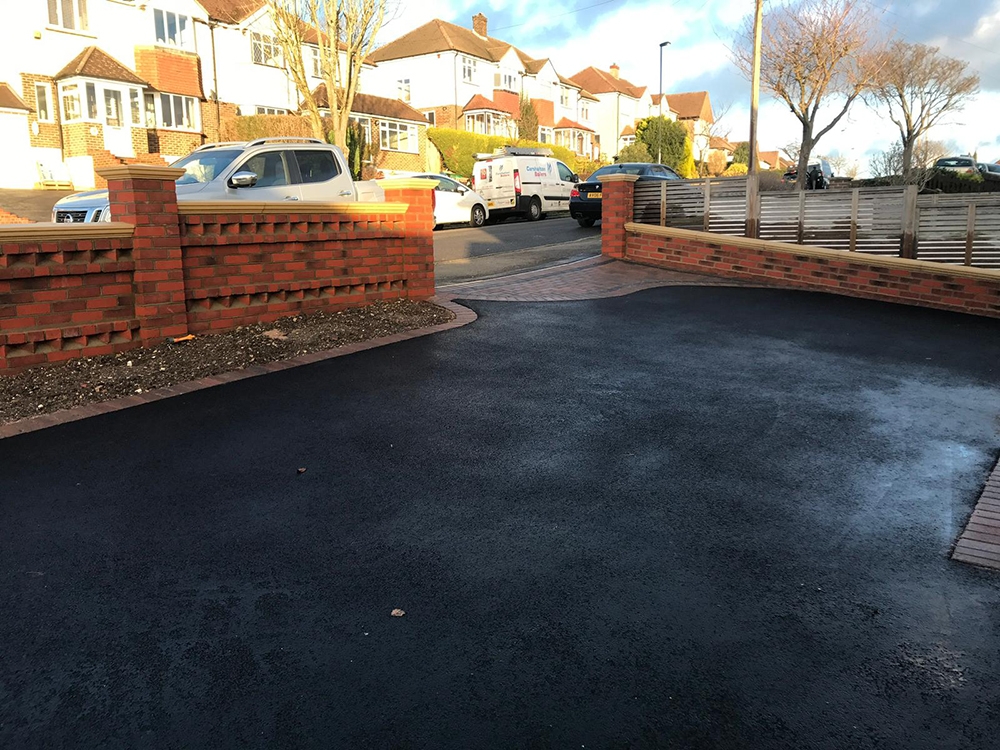 Tarmac driveway with block paving apron and edge completed in Blackfen Tarmac driveway with block paving apron and edge completed in Blackfen